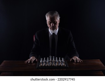 Grandmaster In A Suit Playing Chess