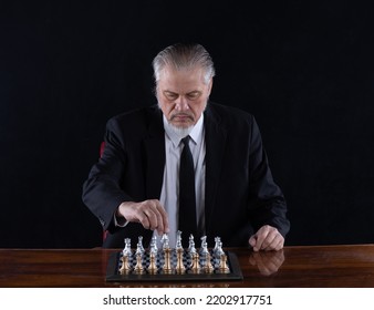 Grandmaster In A Suit Playing Chess