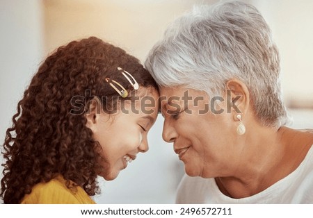 Grandmother, child and forehead touch for love in home, affection and bonding or care in living room. Family, grandchild and grandma on couch and happy on weekend, comfort and smile in house lounge