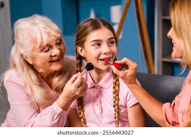 Grandmother, daughter and grandchild together at home, happy domestic life moments - Family having fun, concepts about elderly, mult-generation family and relationship - Powered by Shutterstock