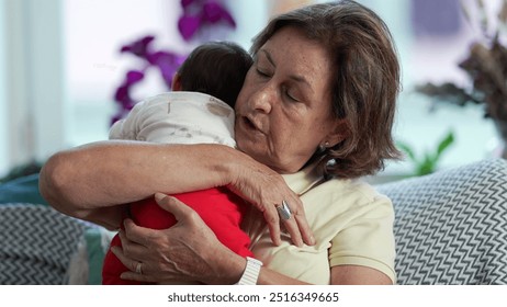 Grandmother embracing newborn grandchild, showcasing a serene and intimate intergenerational family bonding moment - Powered by Shutterstock