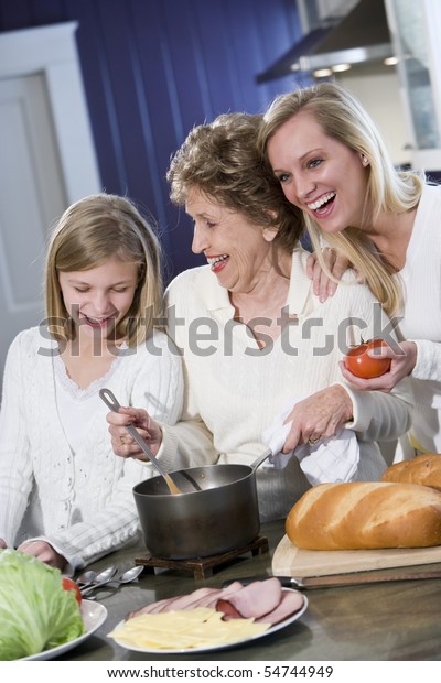 Grandmother Family Cooking Kitchen Smiling Laughing Stock Photo ...