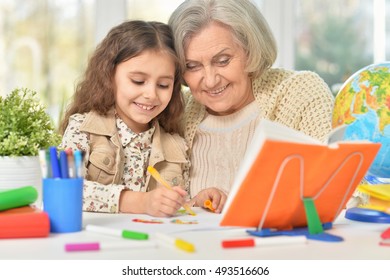 Grandmother Granddaughter Drawing Together Stock Photo 493516606 ...