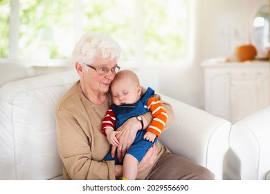 Grandmother Holding Newborn Baby Family Reunion Stock Photo 2029556690 ...