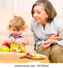 Grandmother Little Granddaughter Eating Fruit Happy Stock Photo ...