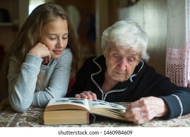 Grandmother Little Girl Granddaughter Reading Book Stock Photo ...