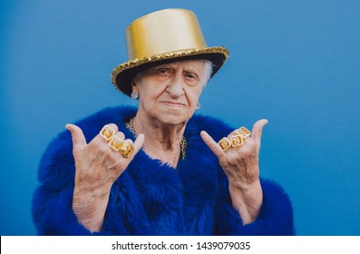 Grandmother portraits on colored backgrounds. Funny moments with a granny woman. Lifestyle and people concepts