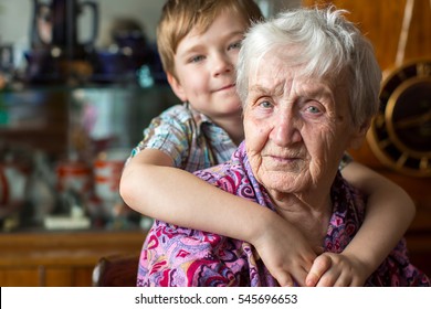 Grandmother with a small boy grandson.