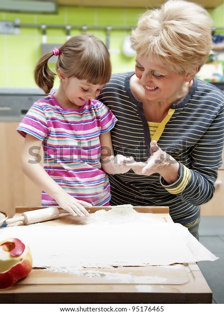 Grandmother Teaching Her Granddaughter Cooking Home Stock Photo (Edit ...