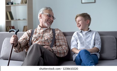 Grandpa And Grandson Laughing Genuinely, Joking, Valuable Fun Moments Together