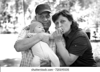 Grandparents With Grandchild, Black And White