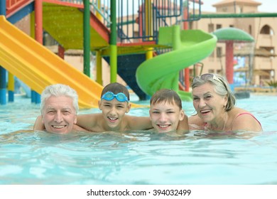 Grandparents With Grandchildren In Pool