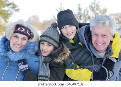 grandparents with gransons outdoors