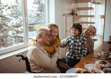 Grandparents having fun with grandchildren at cozy home lunch - Powered by Shutterstock