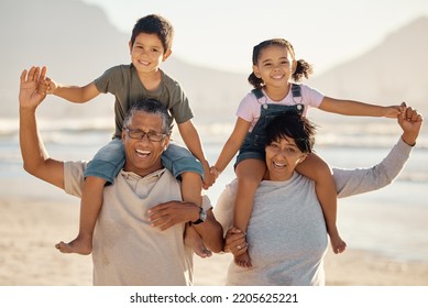 Grandparents, Kids And Family Portrait At Beach Holiday, Summer Vacation And Relax Together. Excited, Smile And Happy Seniors With Piggyback Grandchildren In Sunshine For Fun Play, Happiness And Care