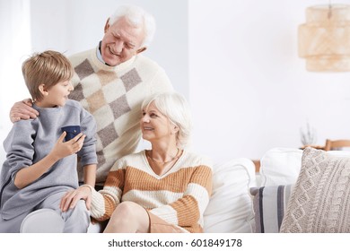 Grandson, Grandma And Grandpa Spending Time Together