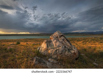 Granite Boulder In Prairie Grasslands Near Soda Lake. Sublette County, Wyoming.