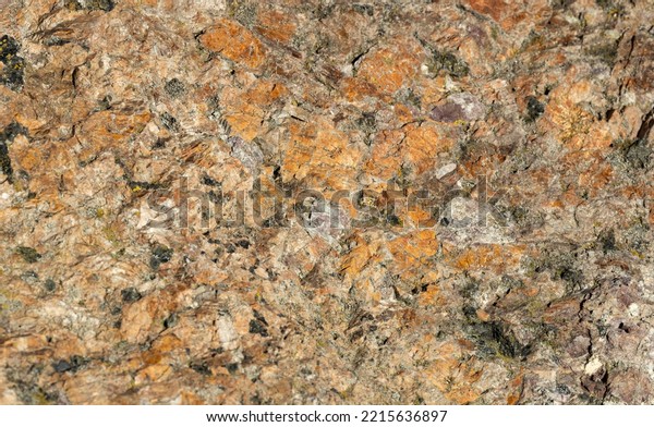 Granite is the commonest igneous rock found on\
Continental Plates. Crystal size depends on then pressure and rate\
of cooling of the Magma. Comprised mainly of Quartz, Biotite mica\
and Feldspar crystal