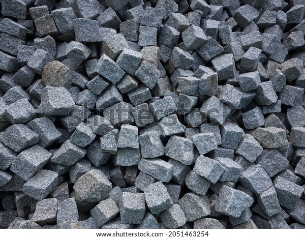 granite cube stones cobblestone with gray\
tones, rough background