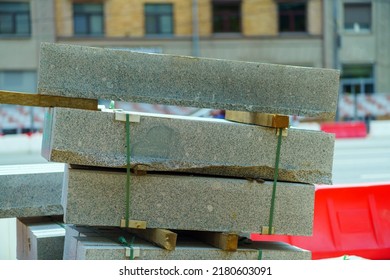 Granite Curb Stones Stand In A Pile Near The Road