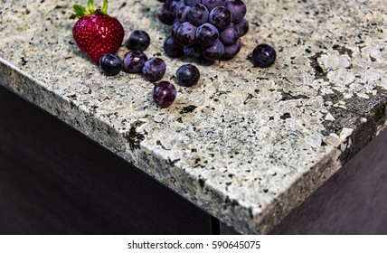 Granite Kitchen Counter Top Made Of Natural Stone Slab With Fruits On It