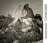 granite rock formation in Vedauwoo Recreation Area, Wyoming,  known to the Arapaho Indians as Land of the Earthborn Spirit, winter scenery in a square format black and white image