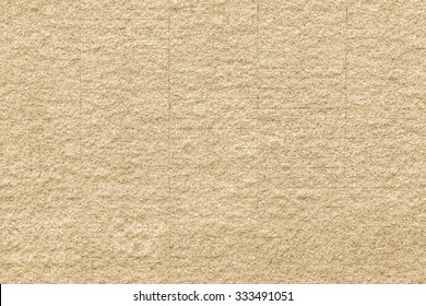 Granite rock stone tile wall aged texture detailed pattern background in light yellow beige creme cream color 