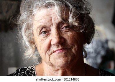 Granny face on a dark background - Shutterstock ID 301214888