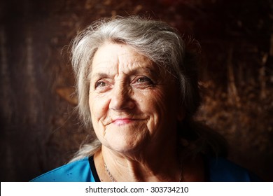 Granny Face On A Dark Background