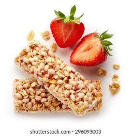 Granola bar with fresh; strawberries and white chocolate isolated on white background