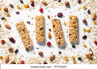 Granola Bar. Healthy Sweet Dessert Snack. Cereal Granola Bar With Nuts, Fruit And Berries On A White Stone Table. Top View.