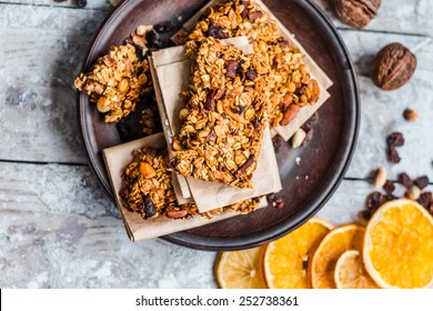 Granola Bars Citrus, Peanut Butter And Dried Fruit, Healthy Eating Concept With Cereal Bar