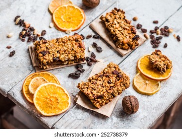 Granola Bars Citrus, Peanut Butter And Dried Fruit, Healthy Eating Concept With Cereal Bar