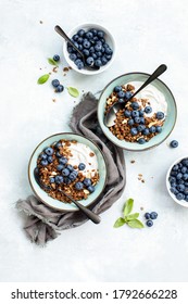 Granola And Blueberry Breakfast With Plain Yogurt, Overhead View Of Table Setting, Healthy Food Concept