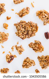 Granola Clusters on the White Background - Shutterstock ID 1043505586