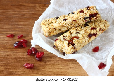 granola or energy bar on wooden background - Powered by Shutterstock