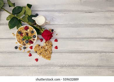 Granola Healthy Snack With Fresh Berry In Heart ShapedValentine's Day Concept