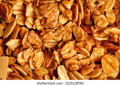 Granola Or Muesli Texture Background With Coconut And Raisin, Close Up, Top View