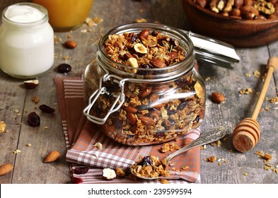 Granola from several types of cereals with nuts,coconut chips and dried cranberry. - Powered by Shutterstock