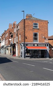 Grantham, Lincolnshire, England- August 9, 2022. Arish Barber Shop Exterior View.