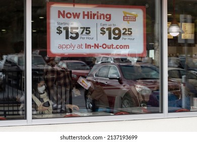 Grants Pass, OR, USA - Mar 19, 2022: Now Hiring Sign With Promised Hourly Wage Rates Is Seen At One Of The In-N-Out Burger Chain Restaurants In Grants Pass, Oregon, Amidst The Labor Shortage.