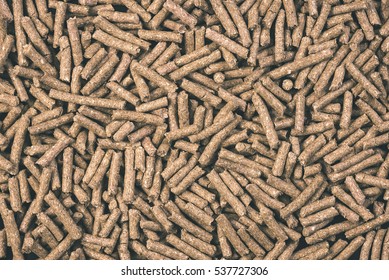 Granulated Animal Food Background Texture Isolated On Black - Vintage Film Effect