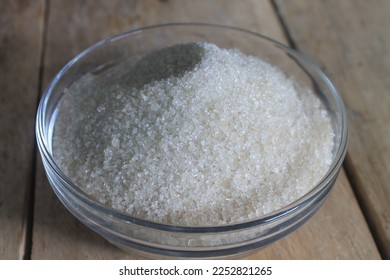 granulated sugar in a glass bowl on the table - Shutterstock ID 2252821265