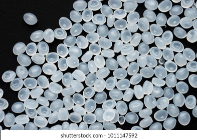 granules of polyethylene on a black matte background