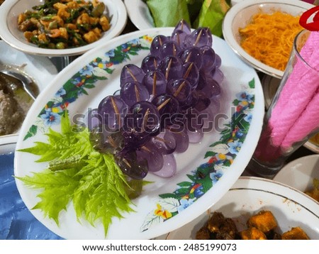 Grape cake made from jelly served at wedding party