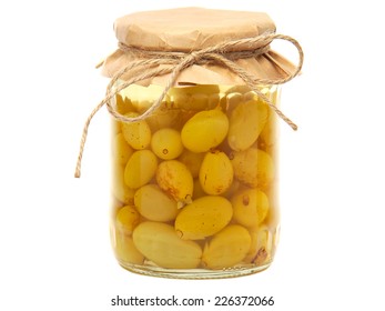 Grape compote in a glass jar, isolated on white