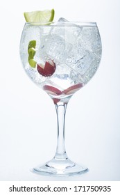 Grape And Lime Gin Tonic Isolated Over White Background