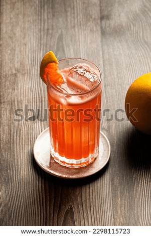 Grapefruit Garibaldi Cocktail refreshment bitter, syrup and grapefruit juice