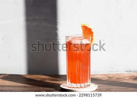 Grapefruit Garibaldi Cocktail refreshment bitter, syrup and grapefruit juice