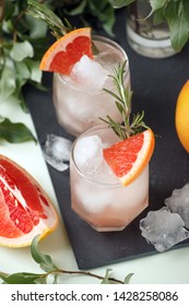 Grapefruit And Rosemary Gin Cocktail, Refreshing Drink With Ice, Summer Time, Resort Bar Cart Menu Concept